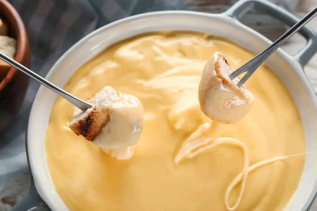 Gravida pode comer fondue de queijo E seguro Verificador