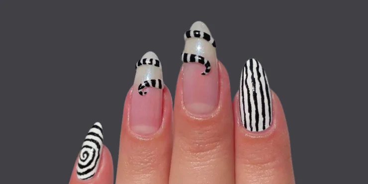 Desenhos de unhas estilo Beetlejuice para inaugurar o Halloween